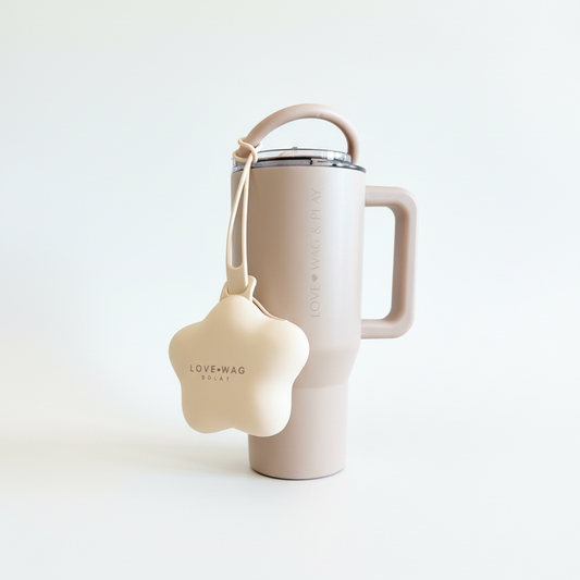 Neutral dog mom tumbler paired with silicone treat holder
	•	Beige aesthetic insulated cup for dog moms
	•	Treat holder clipped to modern tumbler for daily walks
